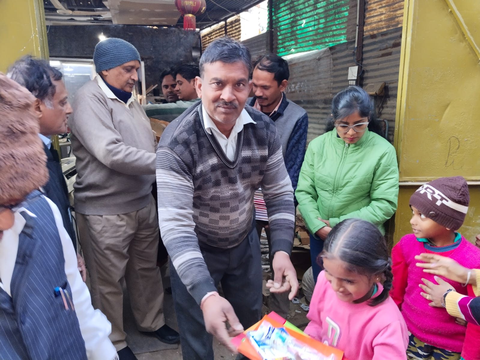 Stationery & sanitary napkin distribution, Village Attawa